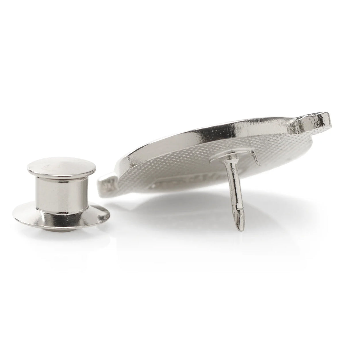 Silver cufflinks on a white background