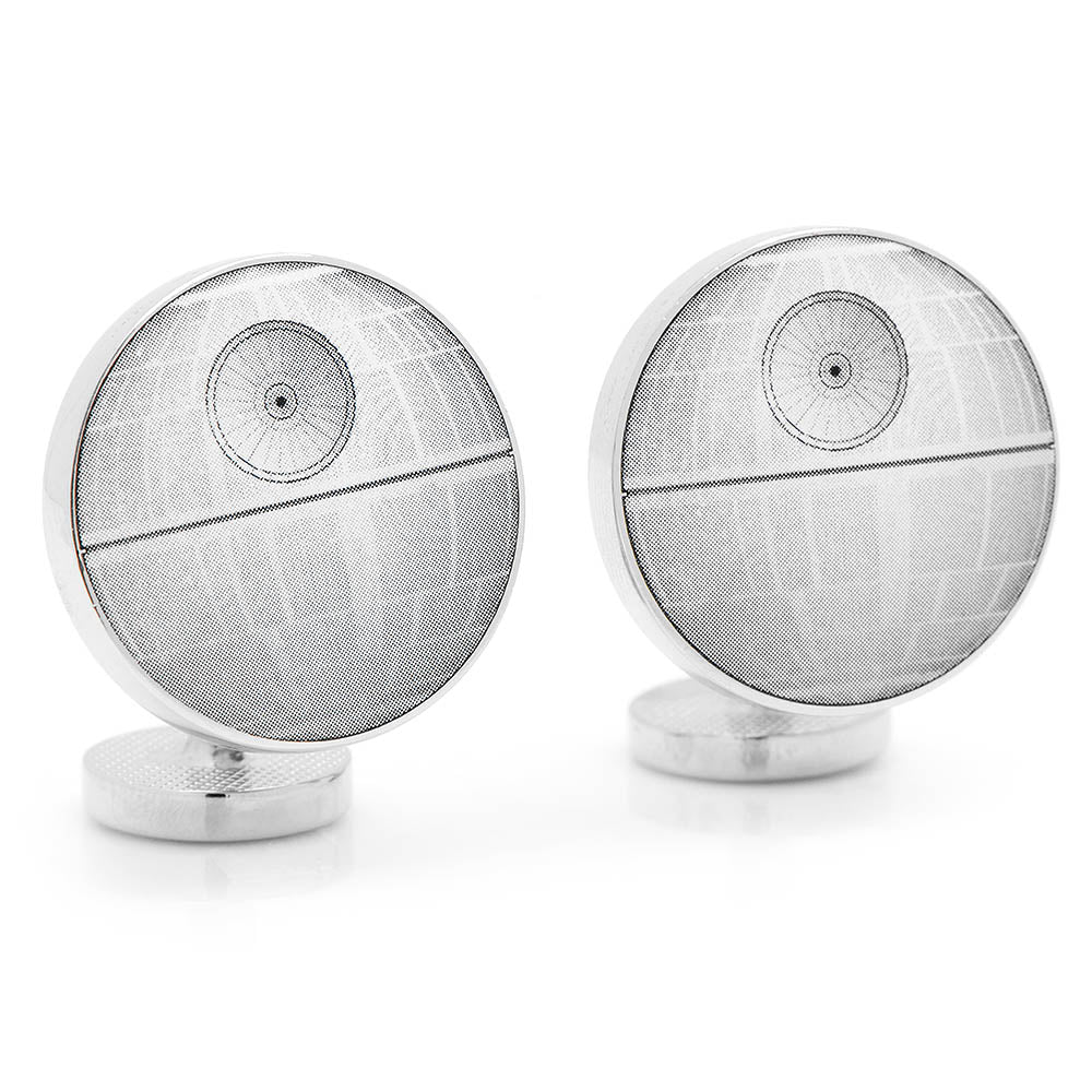 Death Star cufflinks on a white background