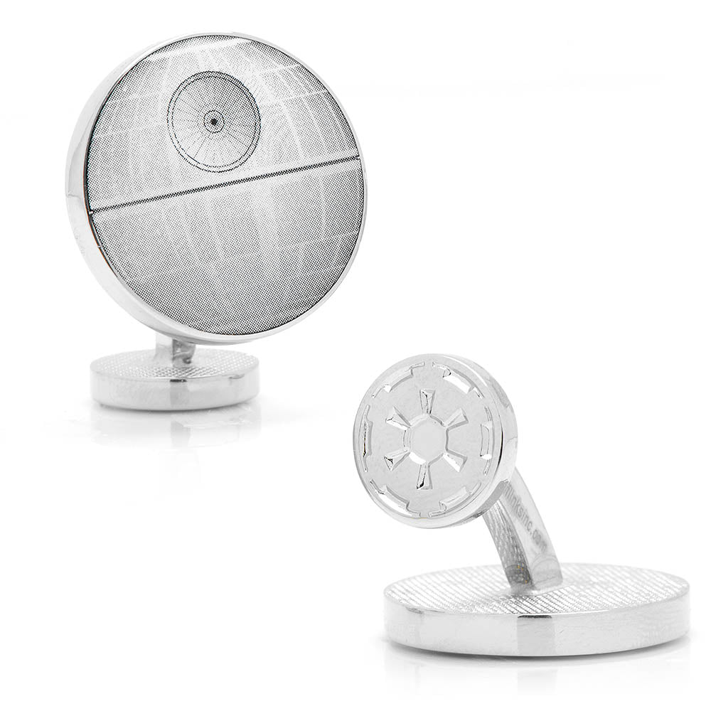 Death Star cufflinks on a white background