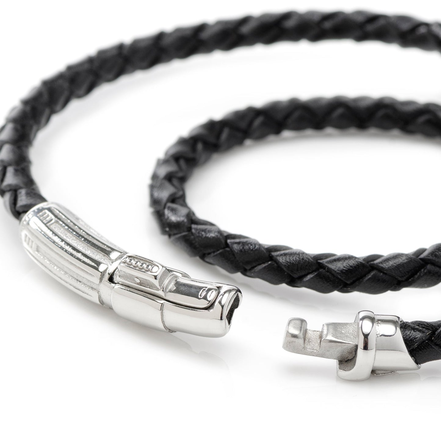Black braided leather bracelet with silver clasp on a white background