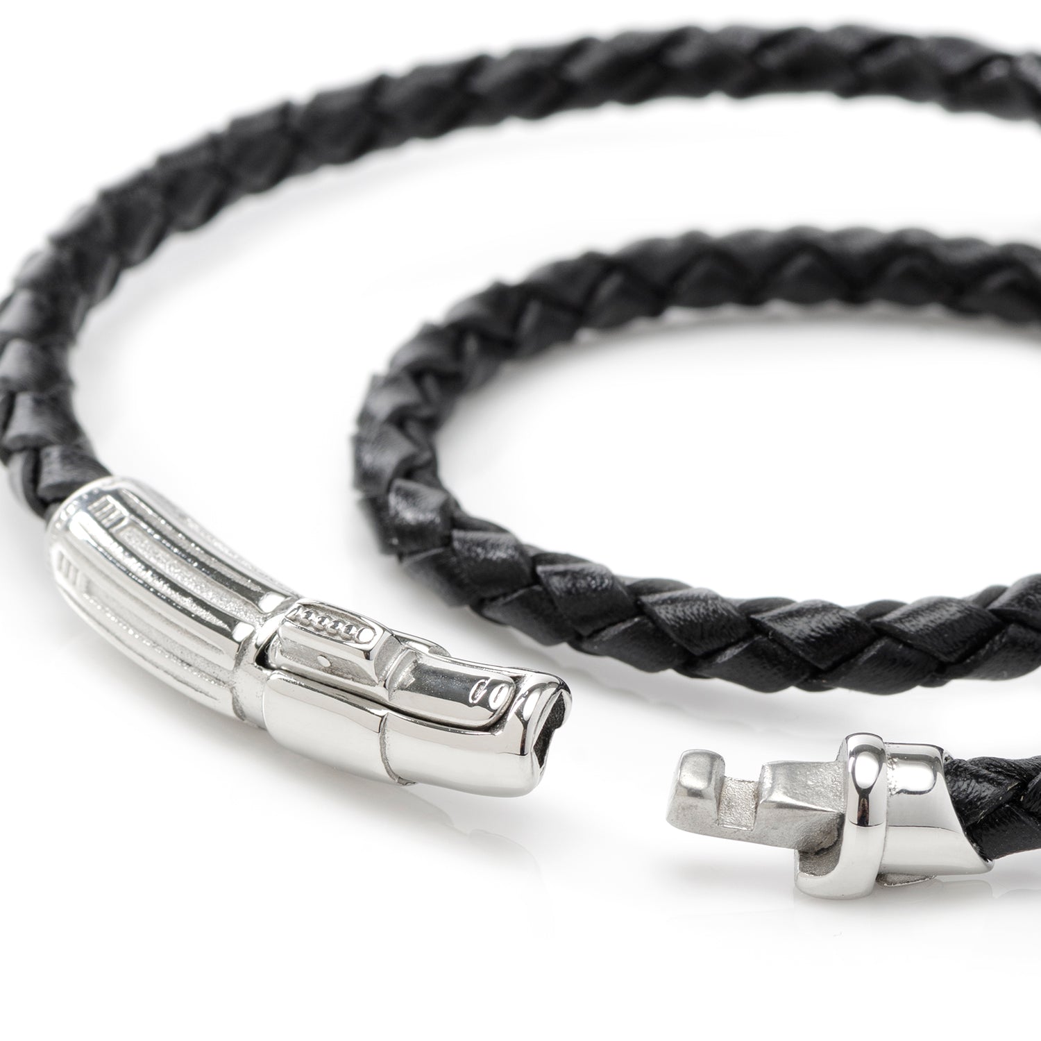 Black braided leather bracelet with silver clasp on a white background