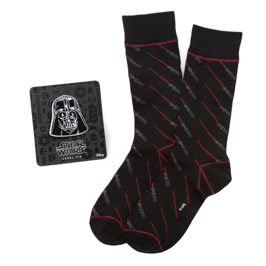 Black socks with red patterns and a Darth Vader label pin on a white background