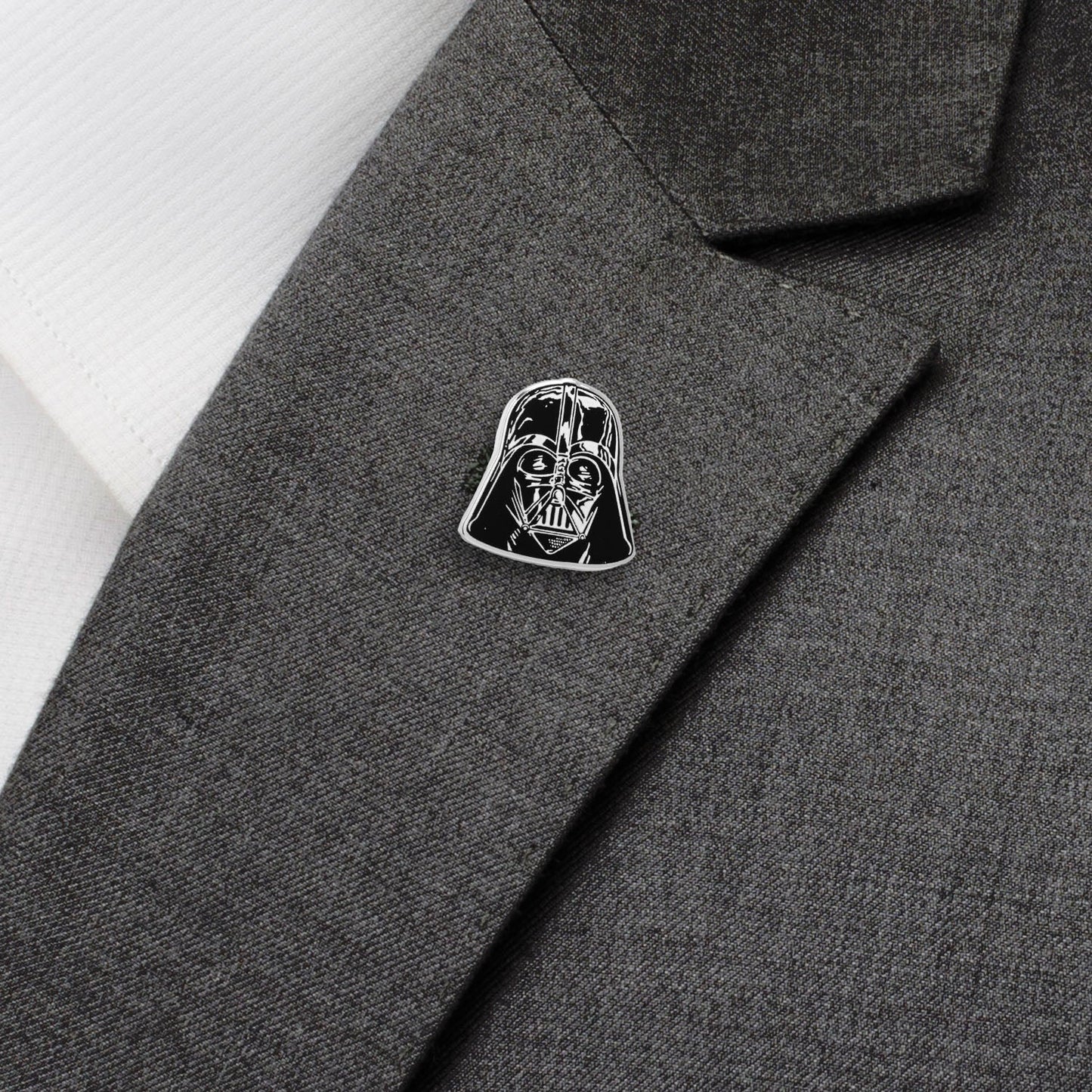 Darth Vader pin on a gray coat