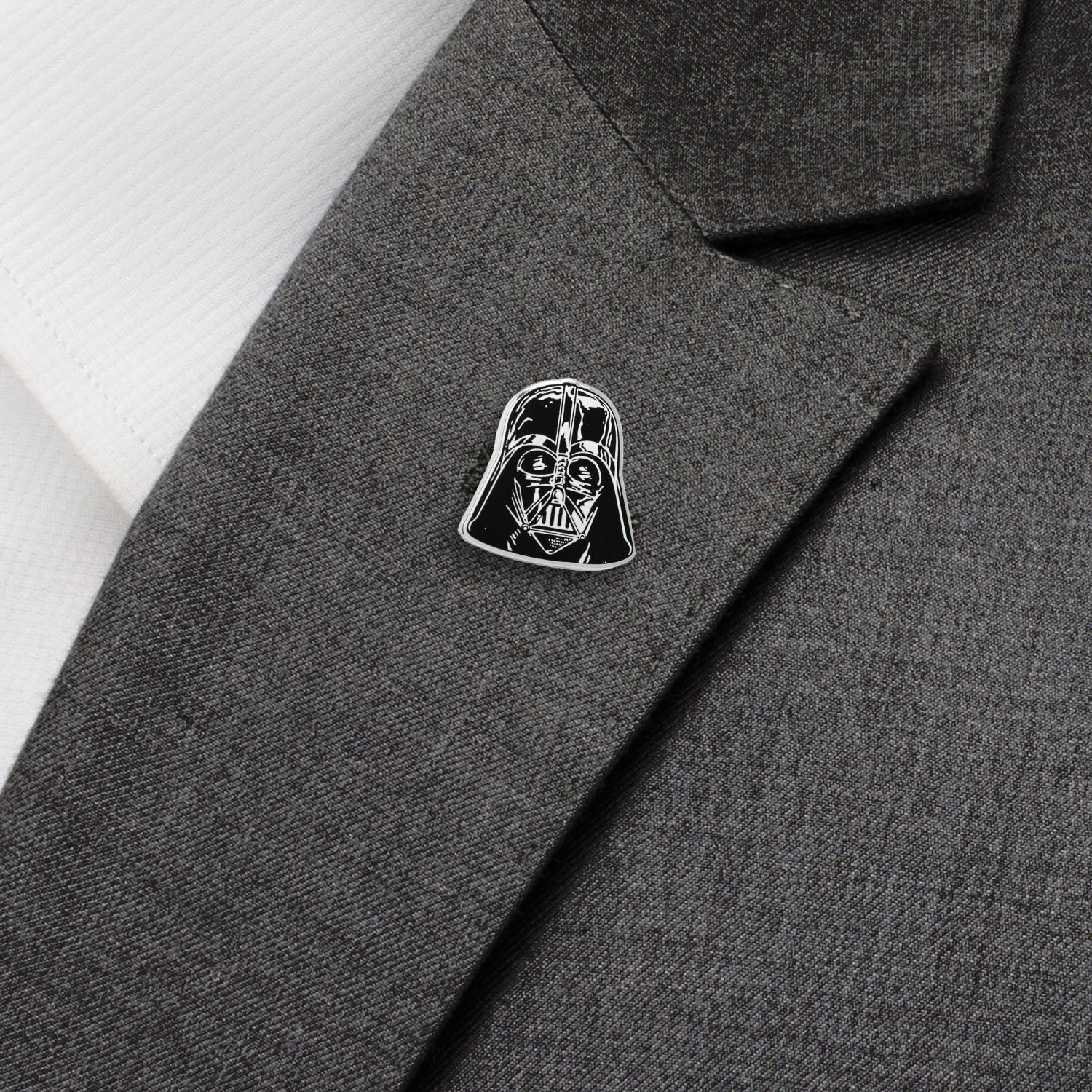 Darth Vader pin on a gray coat