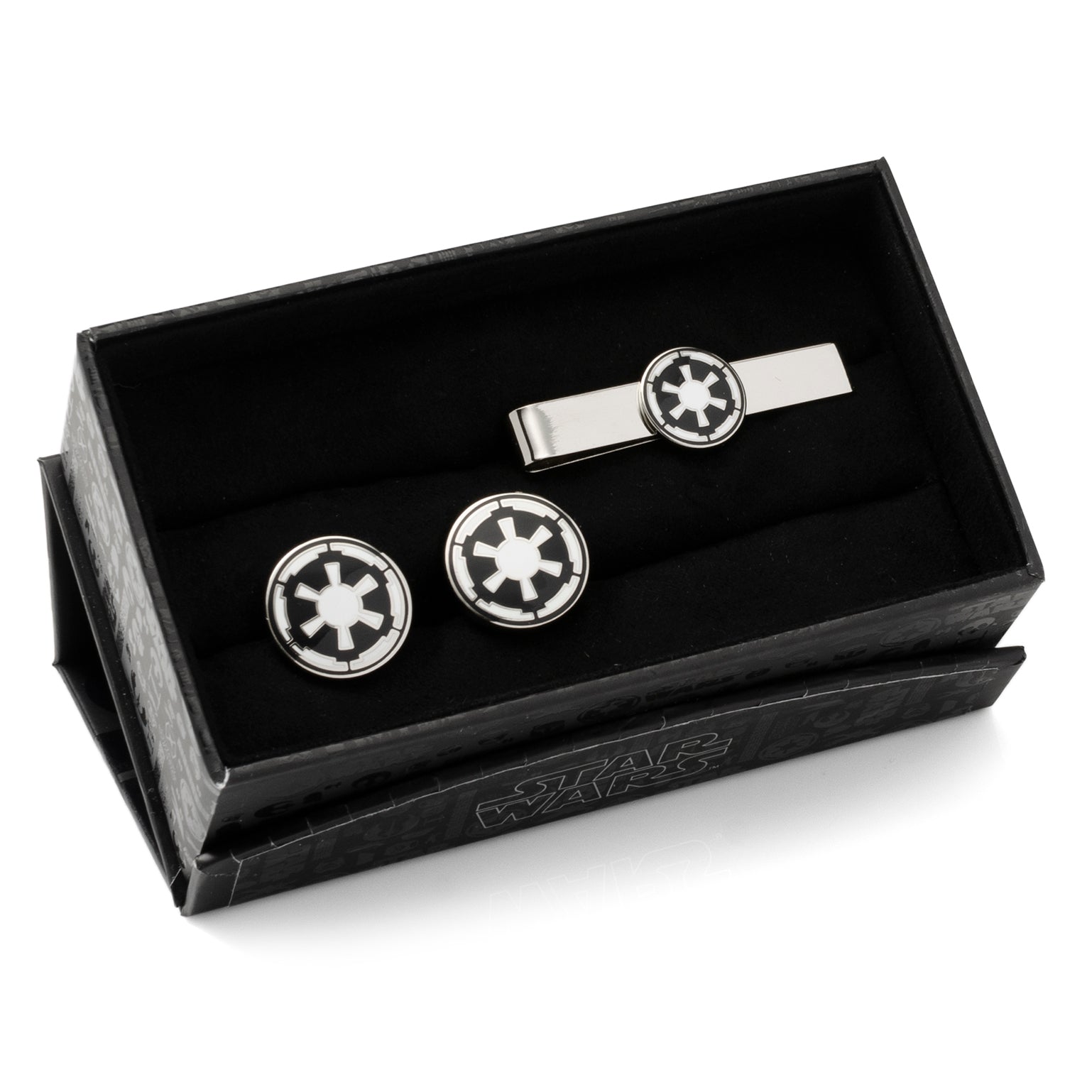 Cufflinks and tie clip set with star emblem design in a black box on a white background