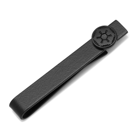 Black tie clip with a circular emblem on a white background