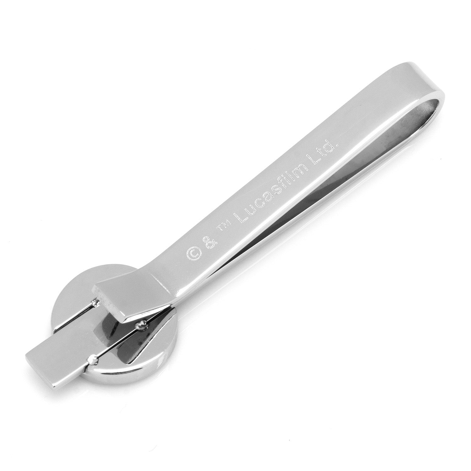 Silver tie clip with brand engraving on a white background