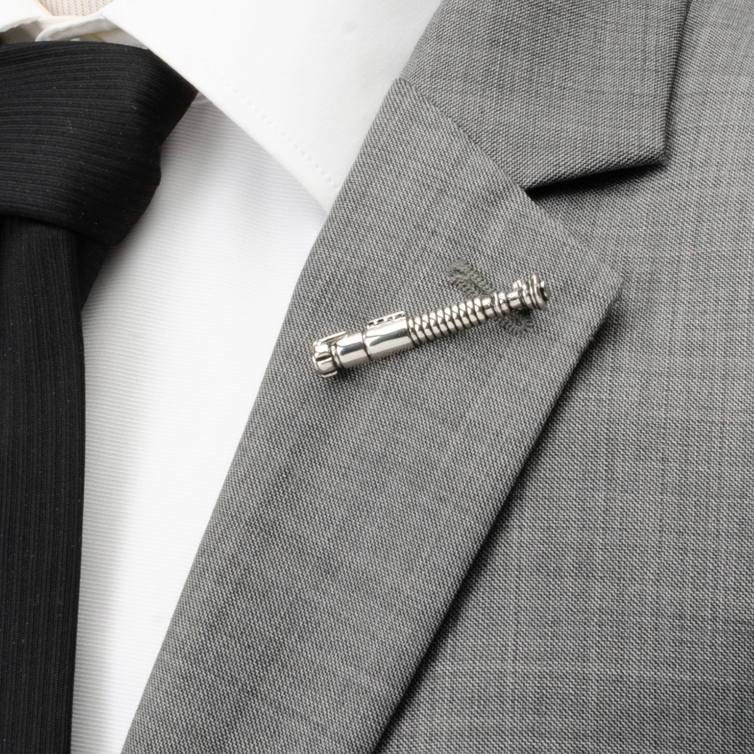 Gray suit jacket with Luke Skywalker Lightsaber Lapel Pin – 3D silver Star Wars pin for collectors and fans