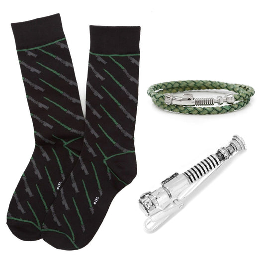 Black socks with green and gray pattern, bracelet, and pen on a white background