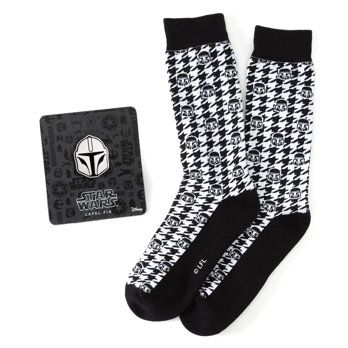 Black and white patterned socks with Star Wars branding on a white background