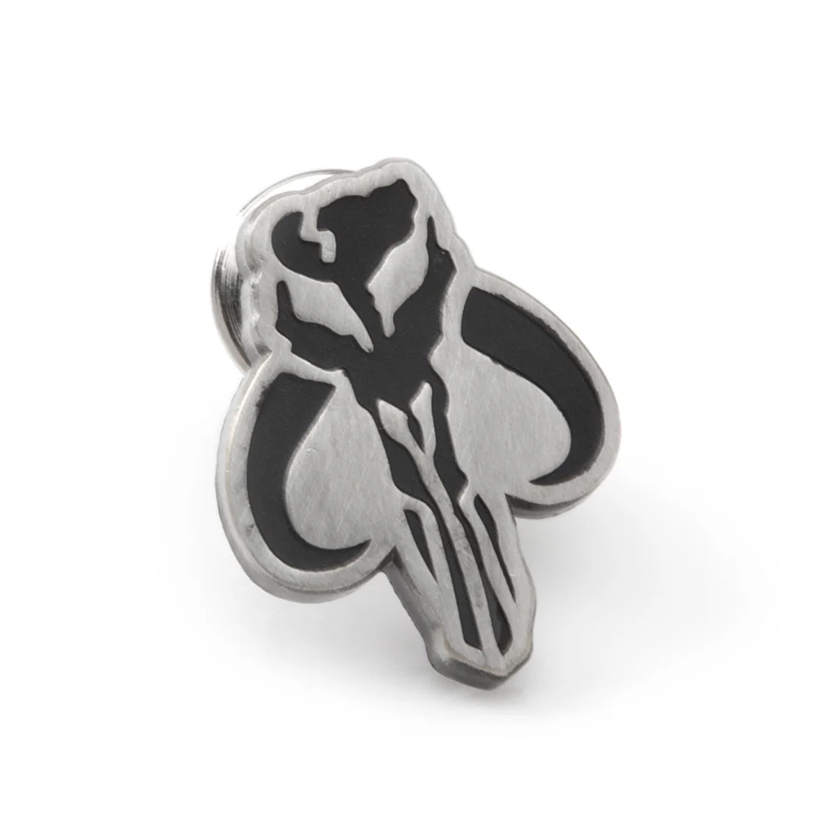 Metallic badge with a black emblem on a white background