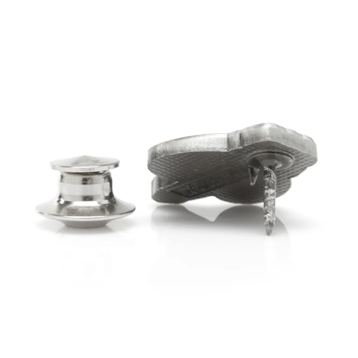 Metallic clip and spool on a white background