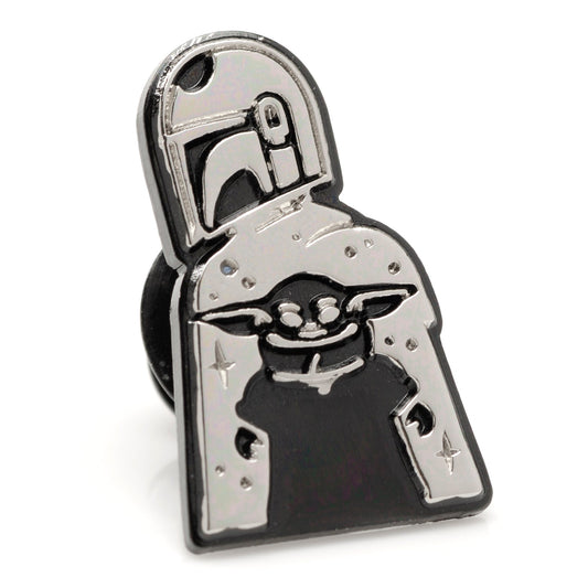 Metallic light switch cover with a character design on a white background