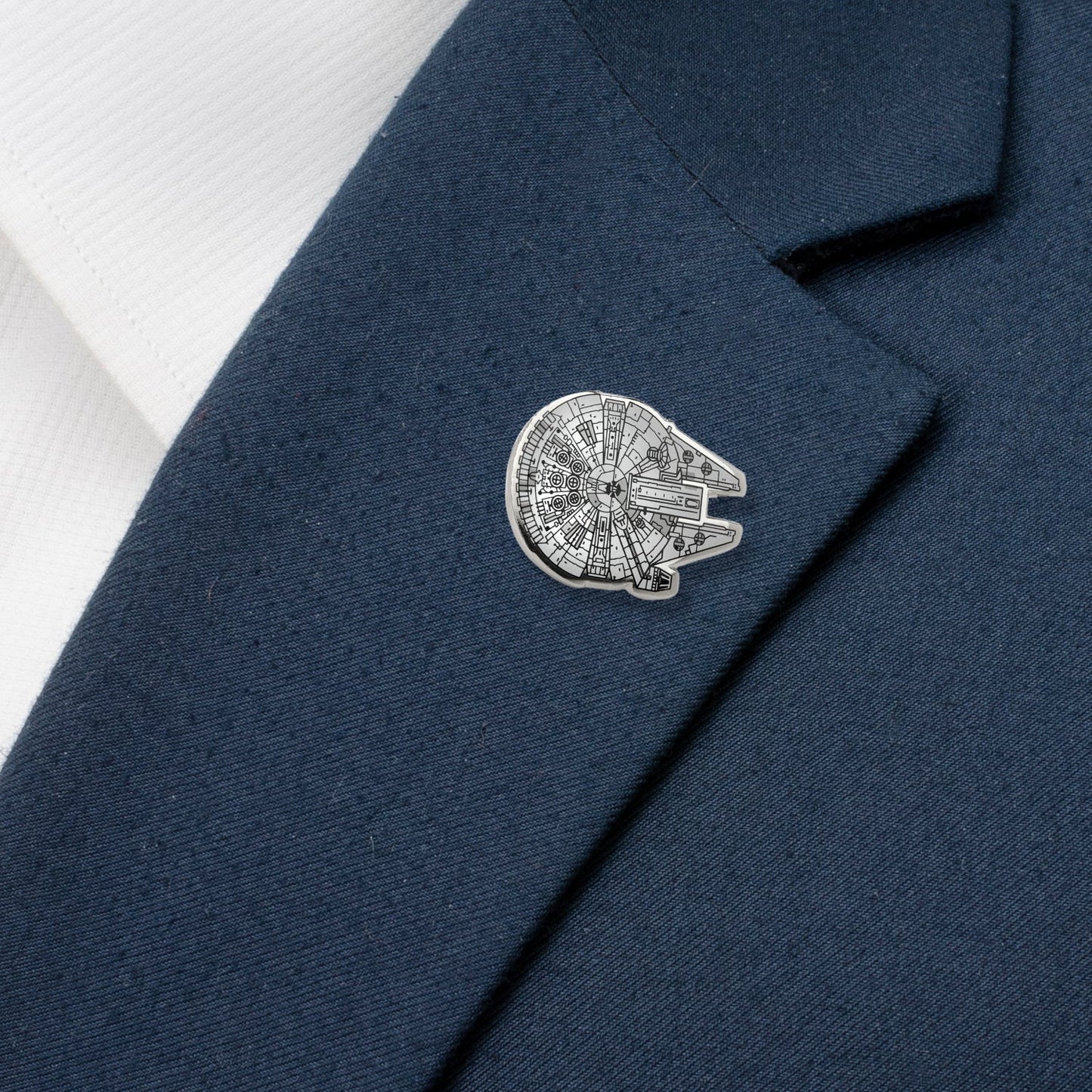 Millennium Falcon pin on a blue blazer