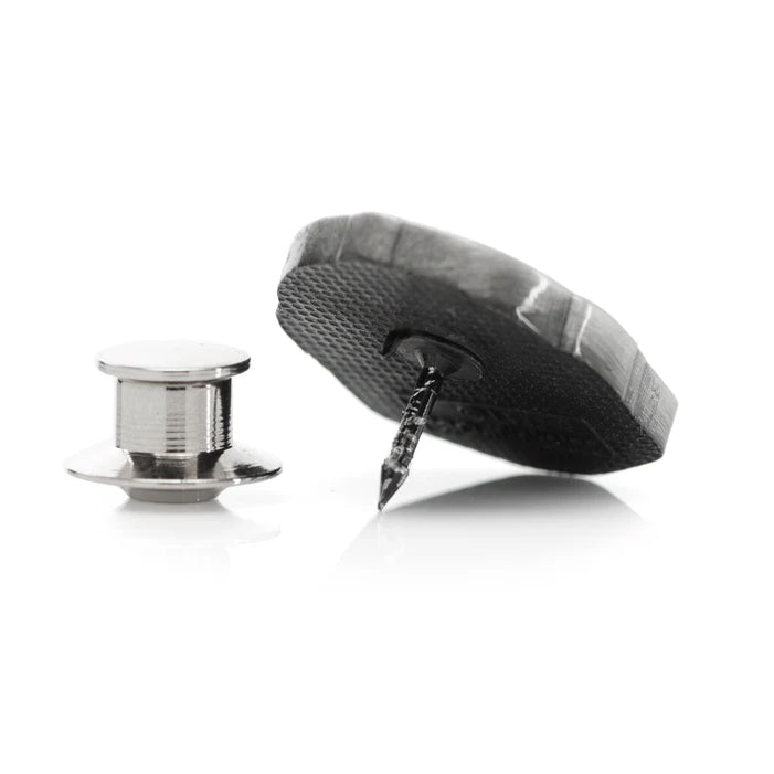 Black rubber stopper with a metal screw on a white background