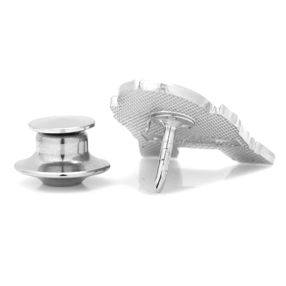 Silver cufflinks with textured design on a white background
