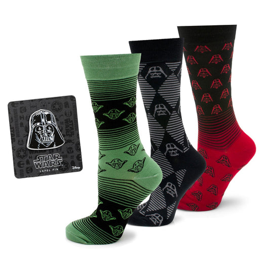 Three pairs of socks with Star Wars designs and a matching pin on a white background