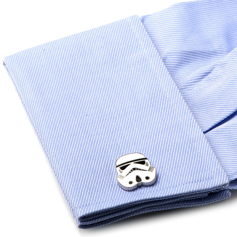 Stormtrooper helmet cufflinks on a blue striped shirt