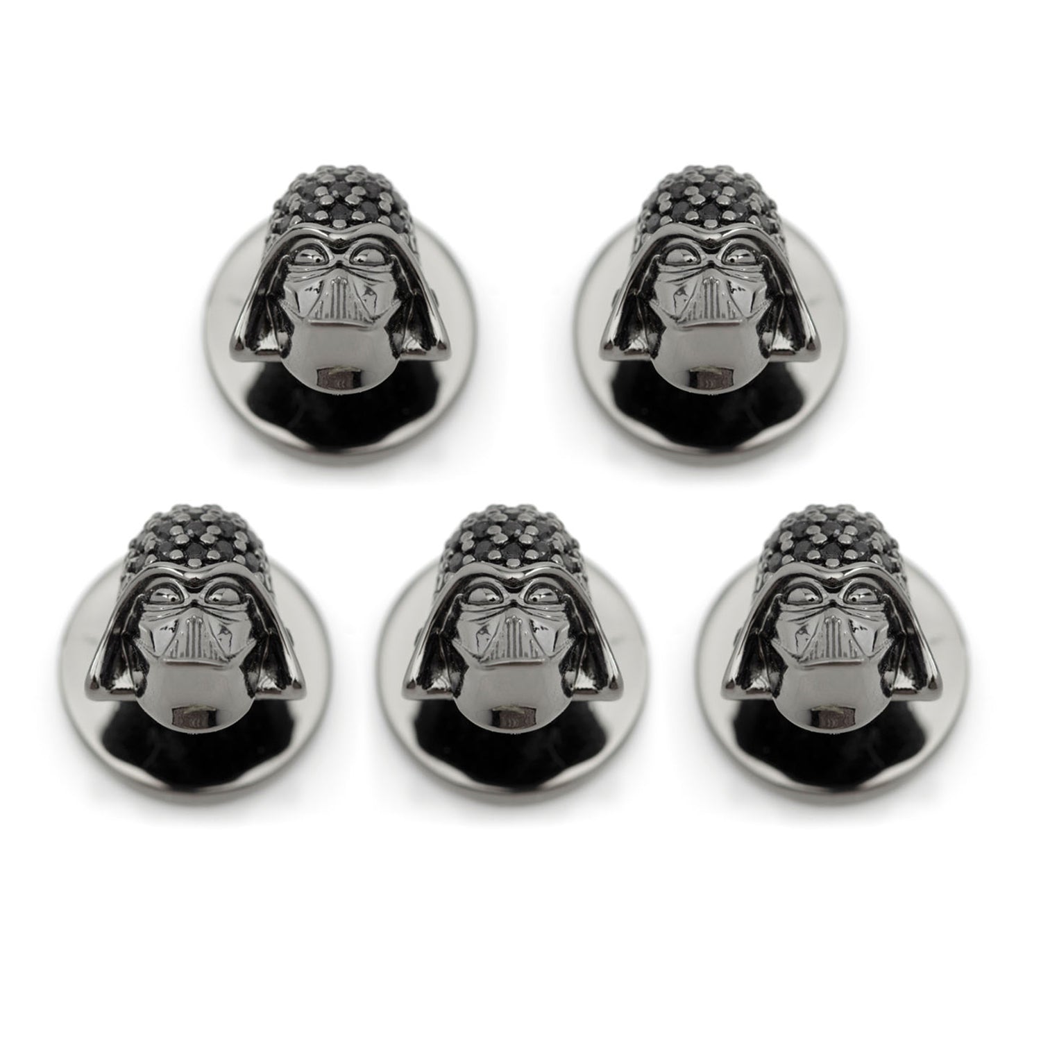 Five metallic Darth Vader head emblems on a white background