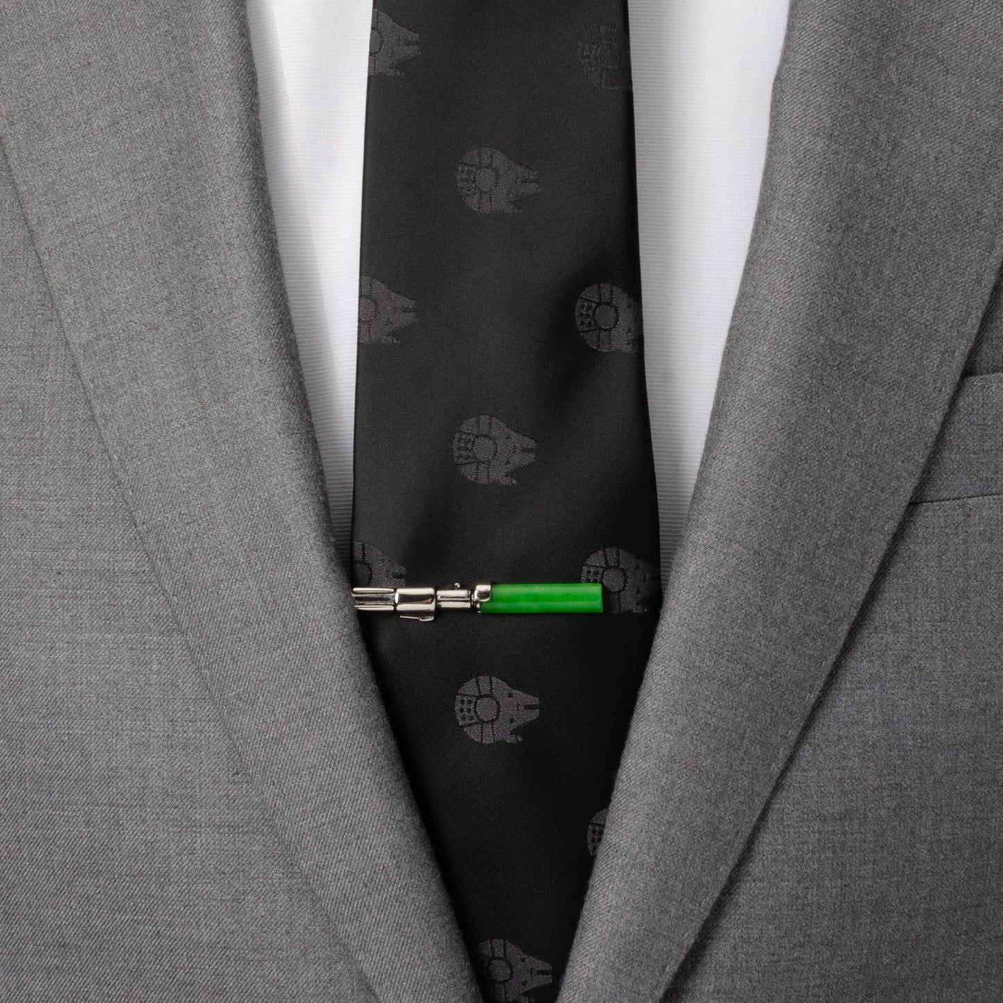Gray suit jacket with a black tie featuring starfleet insignias and a green pen clip. Star Wars Yoda LIGHTSABER Tie Clip