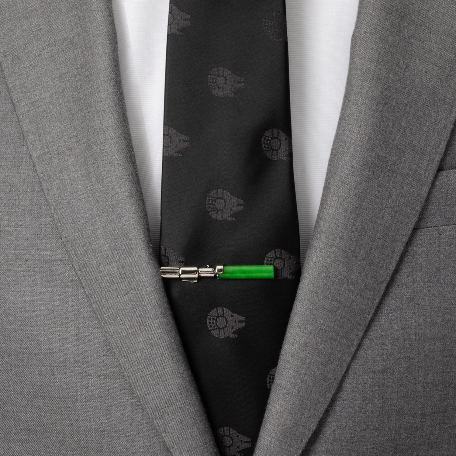 Gray suit jacket with a black tie featuring starfleet insignias and a green pen clip. Star Wars Yoda LIGHTSABER Tie Clip