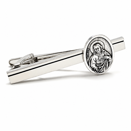 Silver Sacred Heart of Jesus tie clip for men with black accent stripe on white background