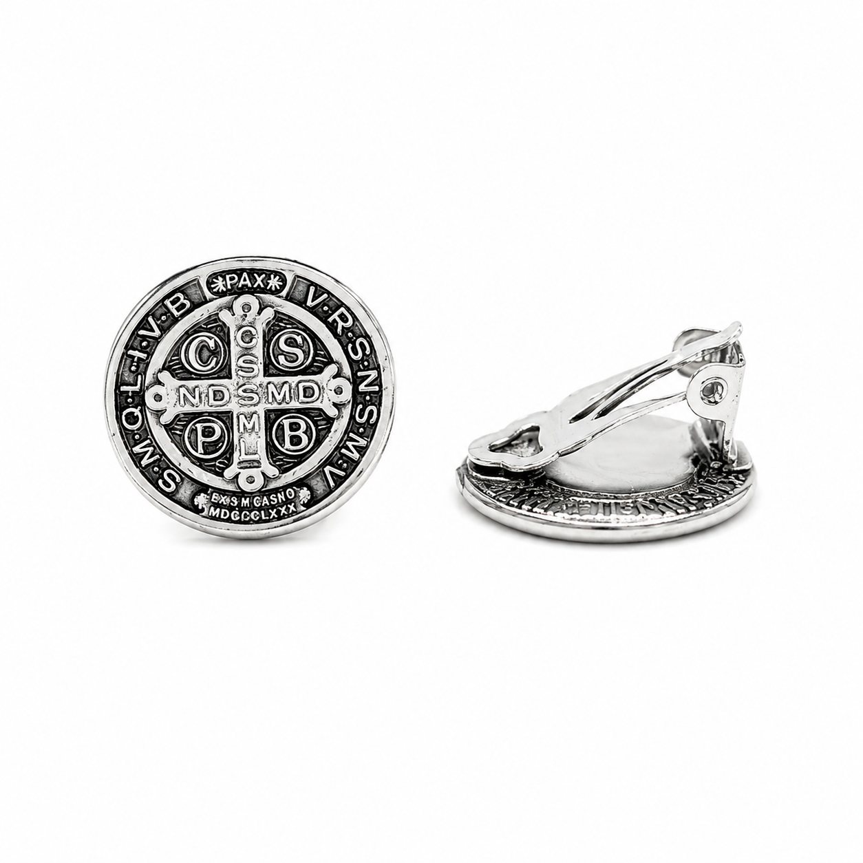 Silver Saint Benedict clip-on earrings featuring detailed Catholic medal design with comfortable non-pierced clip backs on a pure white background.