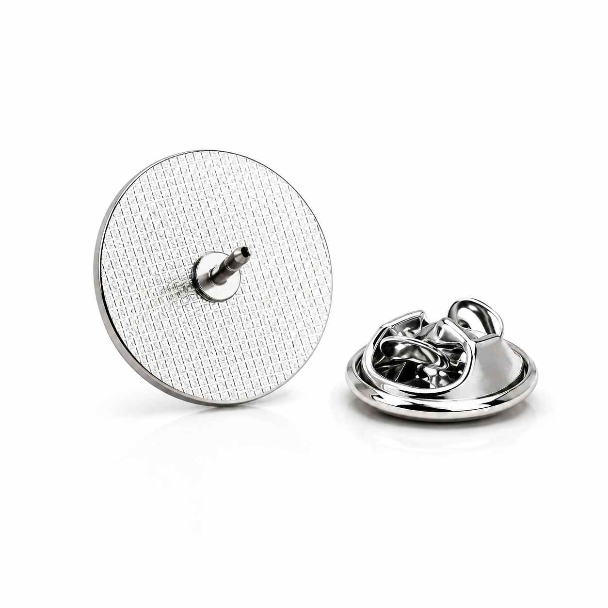 Silver textured round lapel pin on a white background