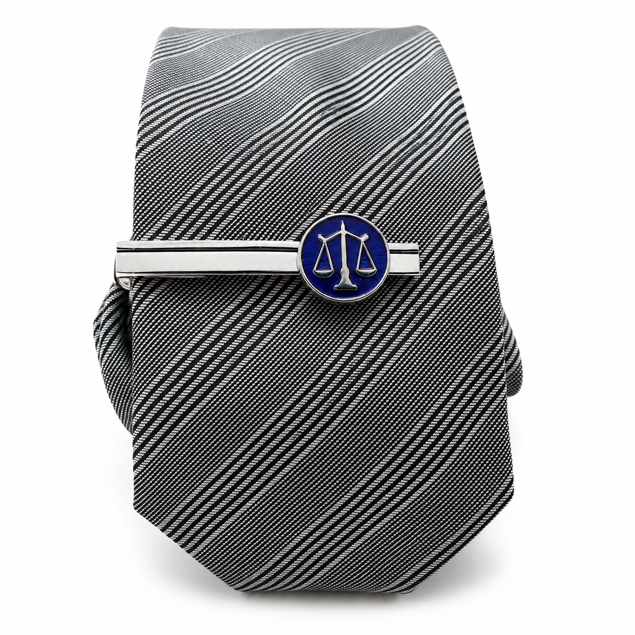 Gray striped tie with a silver and blue tie clip on a white background
