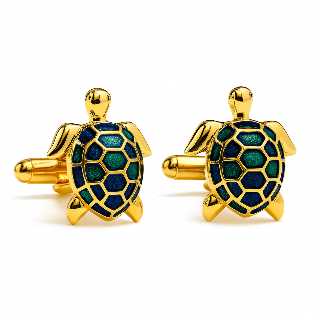 Gold turtle-shaped cufflinks with green and blue design on a white background