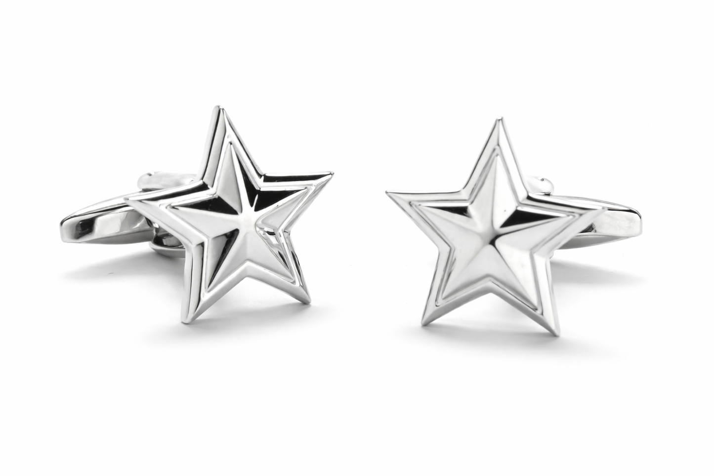 Star-shaped silver cufflinks on a white background