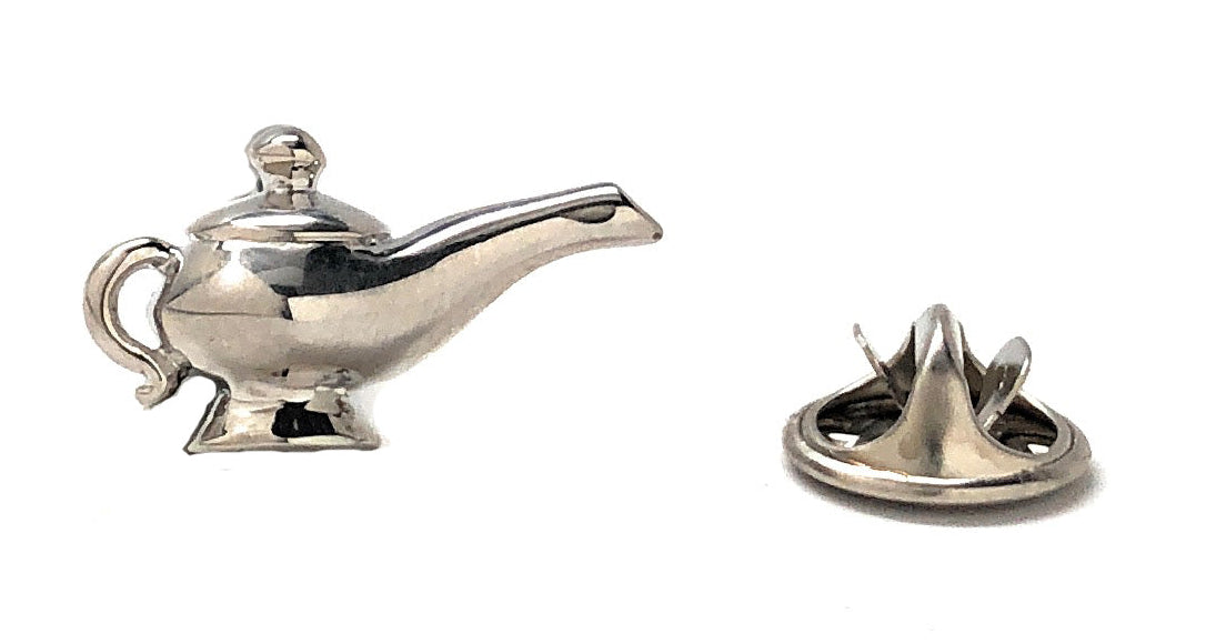 Silver genie lamp lapel pin with polished metal finish and secure clutch backing