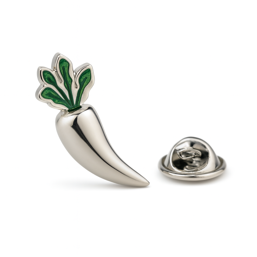 Metallic carrot-shaped lapel pin with green top on a white background