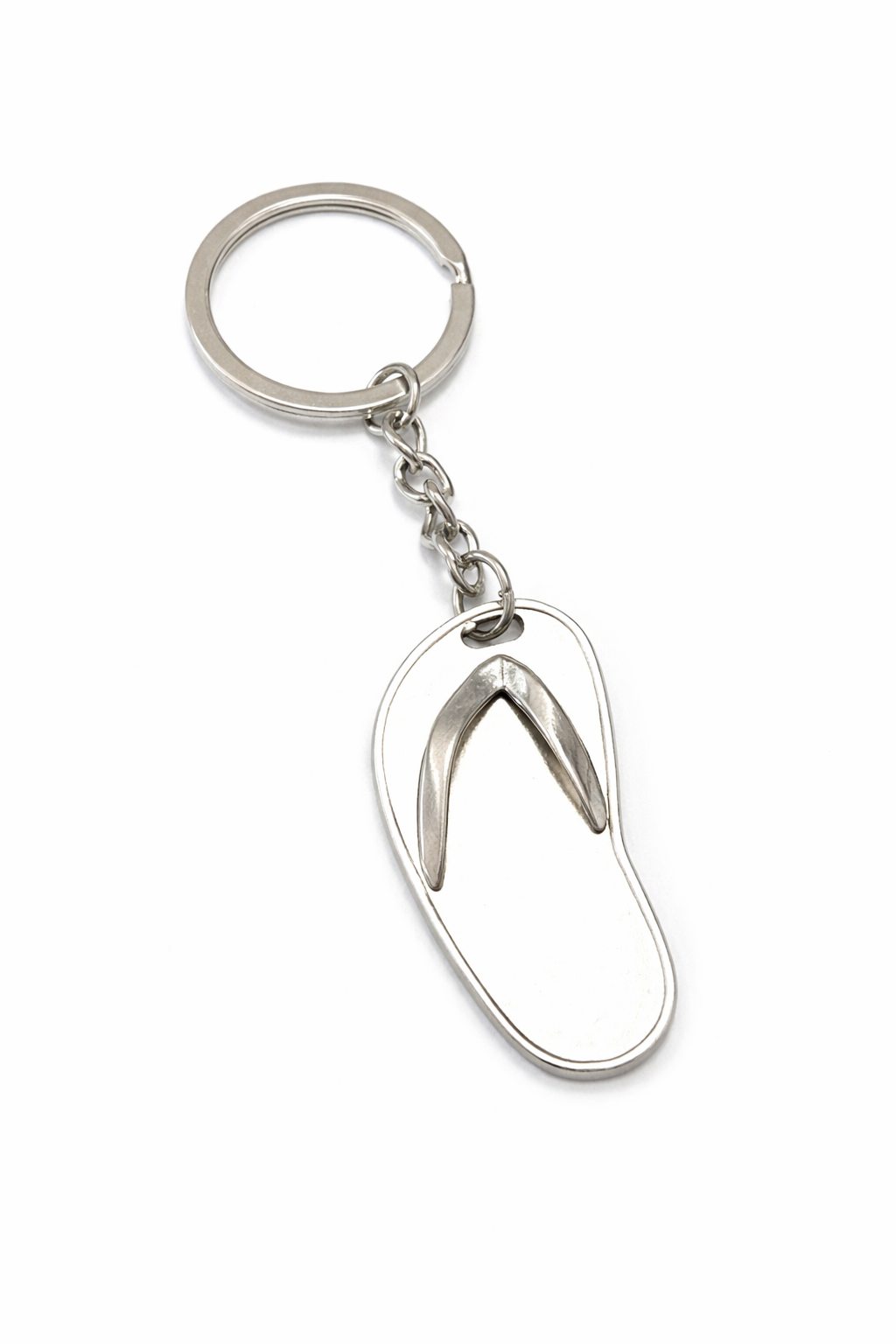 Silver flip-flop shaped keychain on a white background