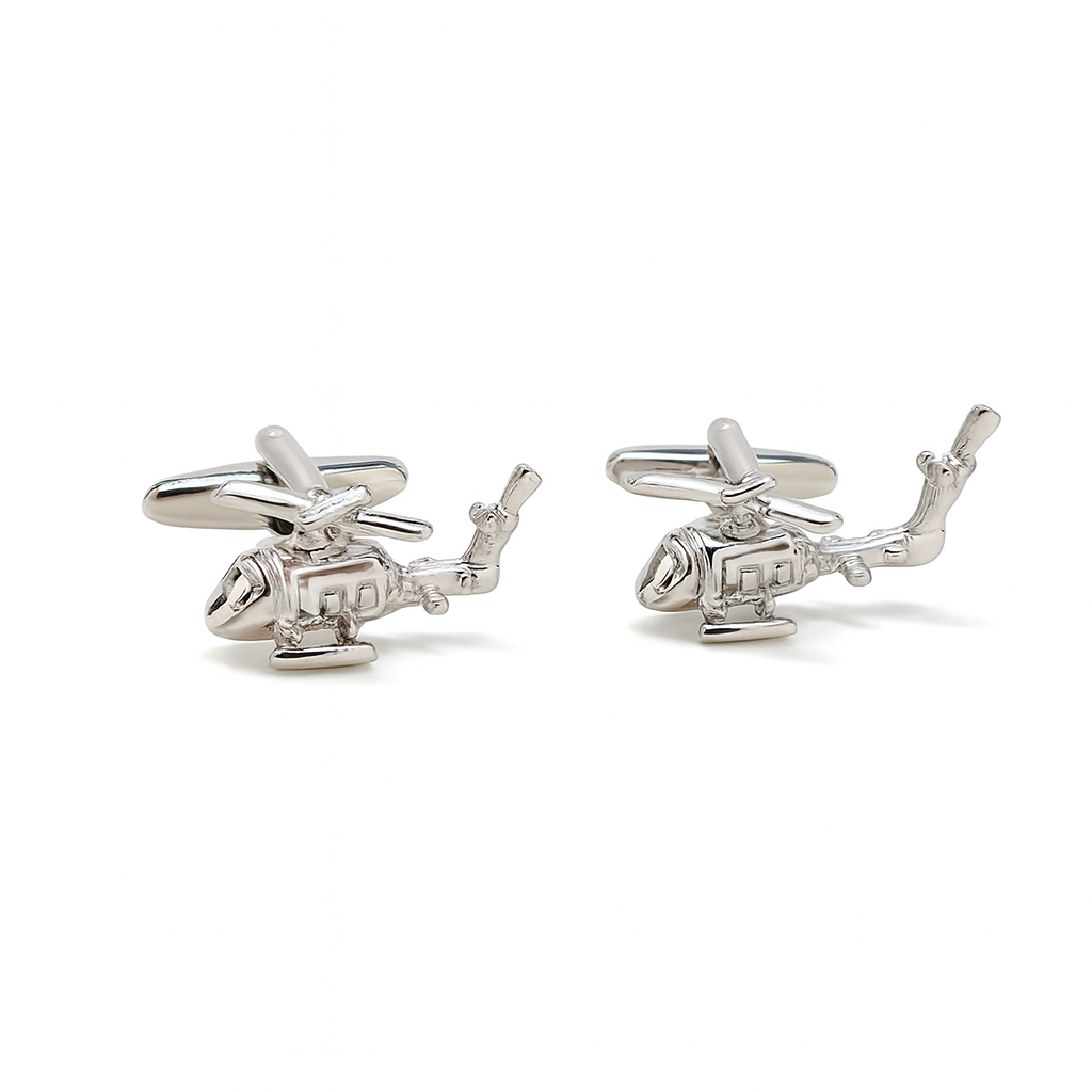 Silver helicopter-shaped cufflinks on a white background
