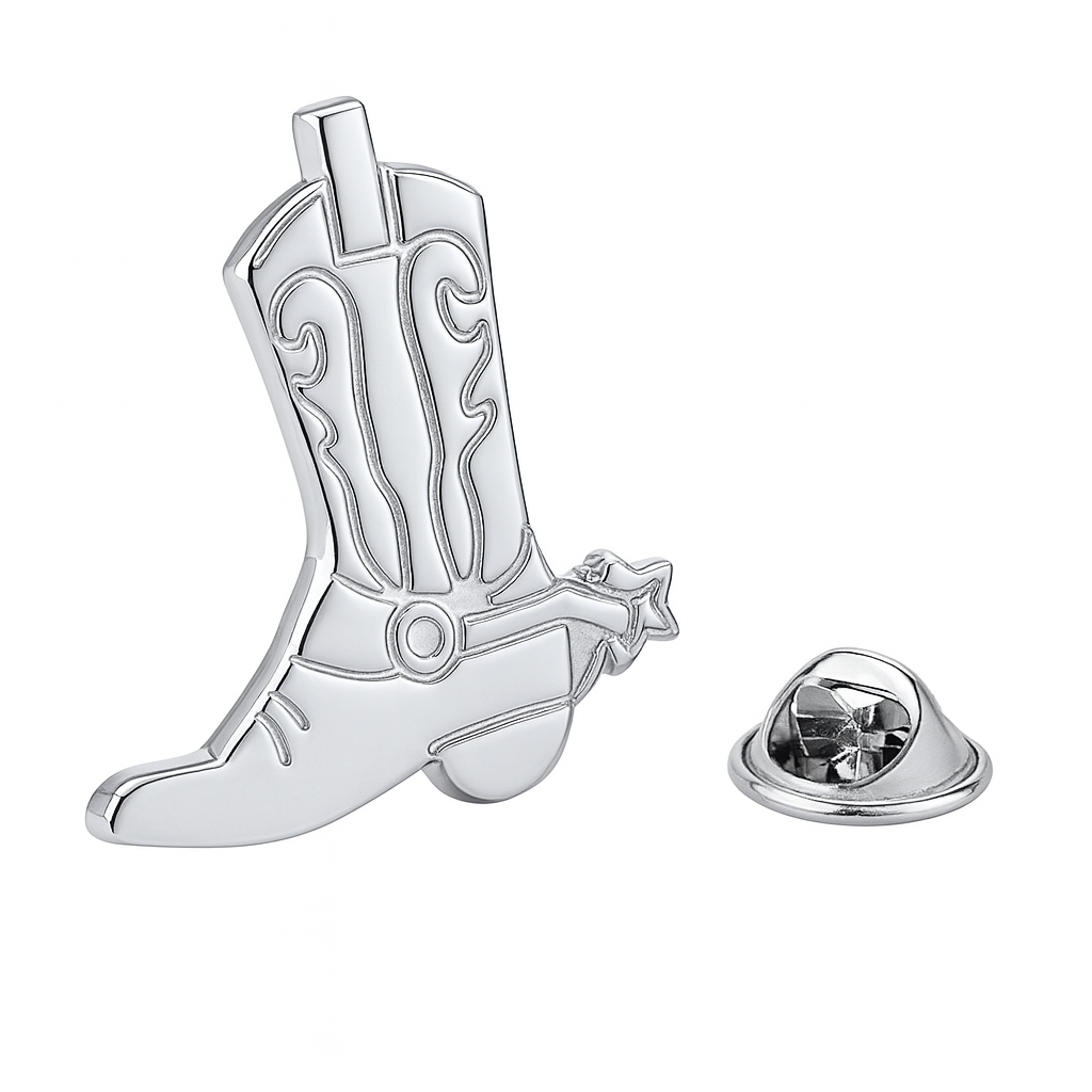 Silver cowboy boot-shaped lapel pin on a white background