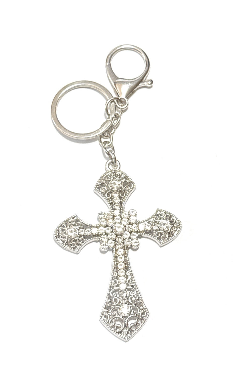 Silver cross keychain with intricate design on a white background