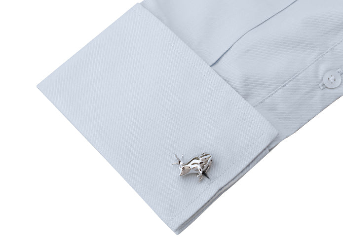 Silver prince charming cufflinks on a light blue shirt cuff