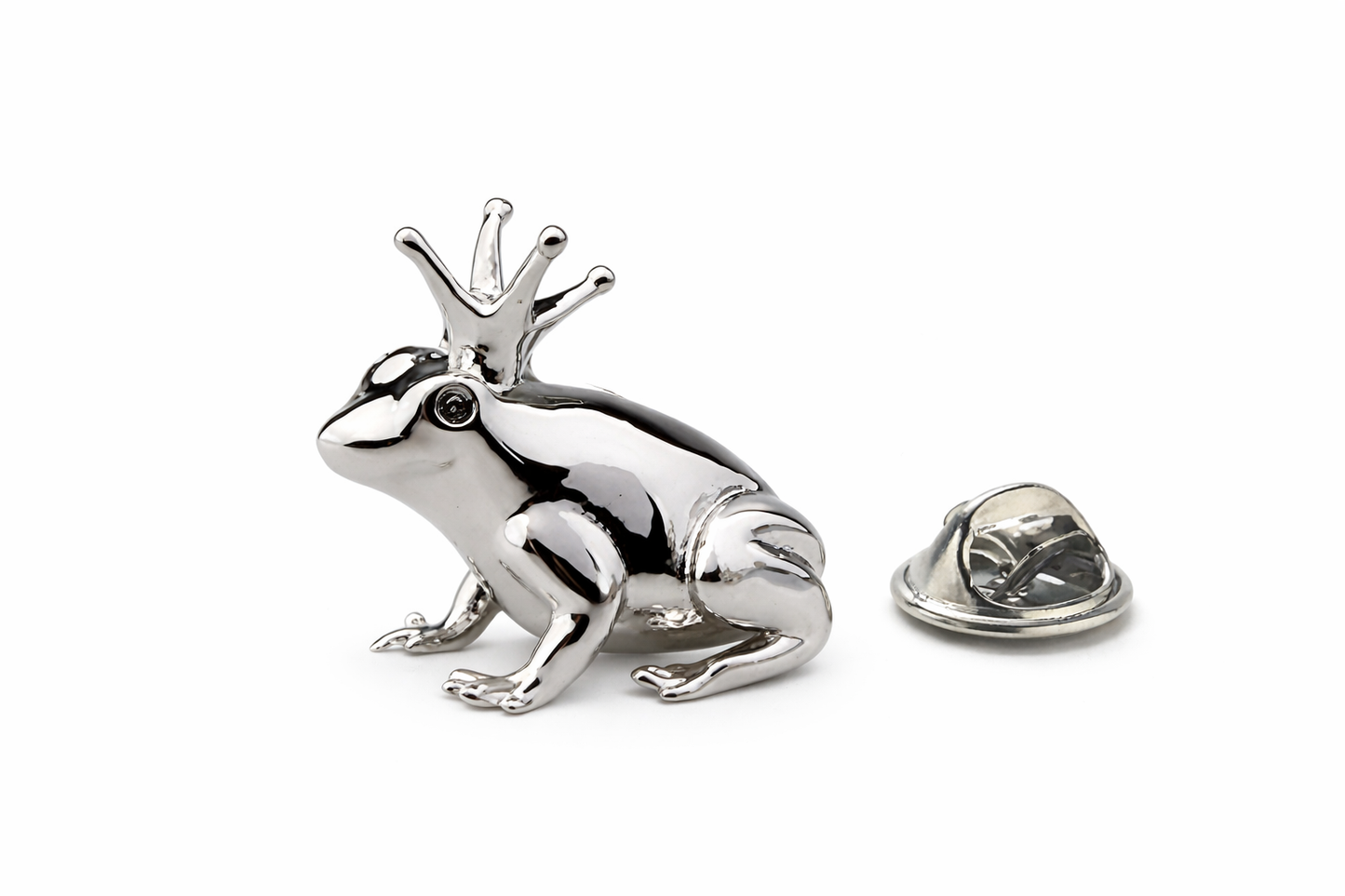 Silver frog-shaped lapel pin on a white background