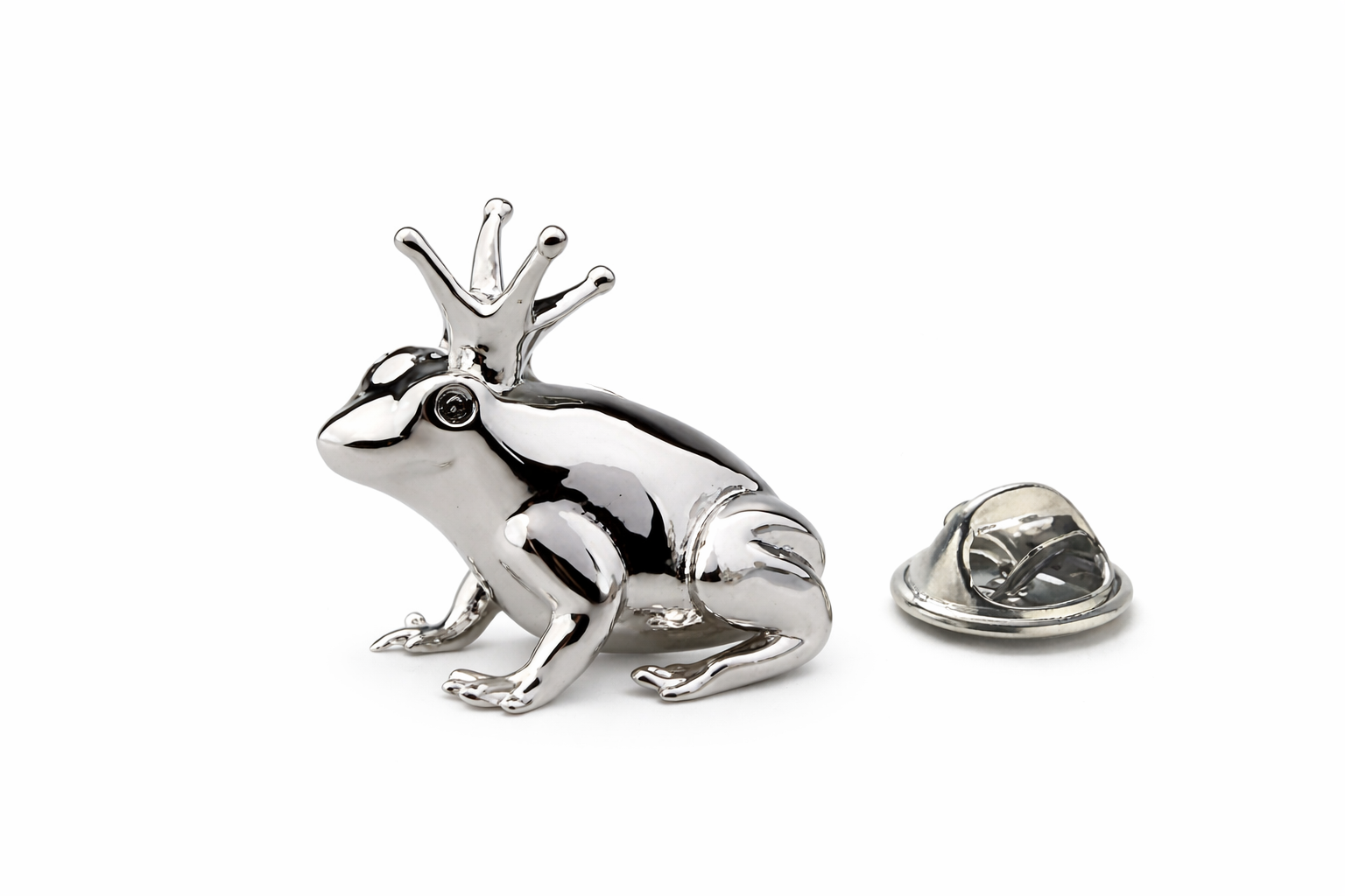 Silver frog-shaped lapel pin on a white background