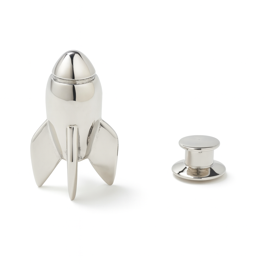 Silver rocket-shaped lapel pin on a white background