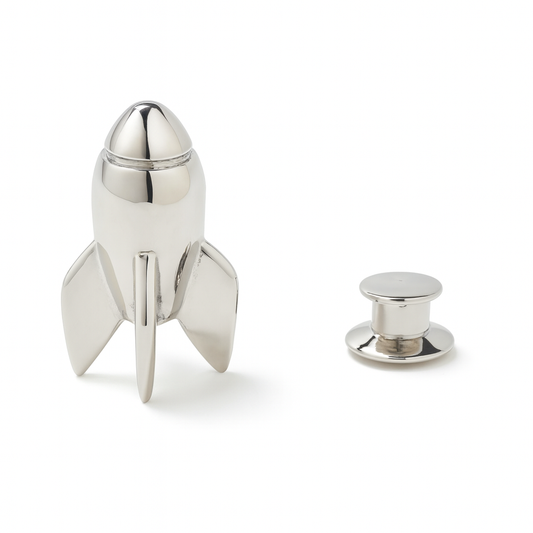Silver rocket-shaped lapel pin on a white background