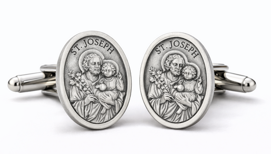 Silver St. Joseph cufflinks with religious design on a white background