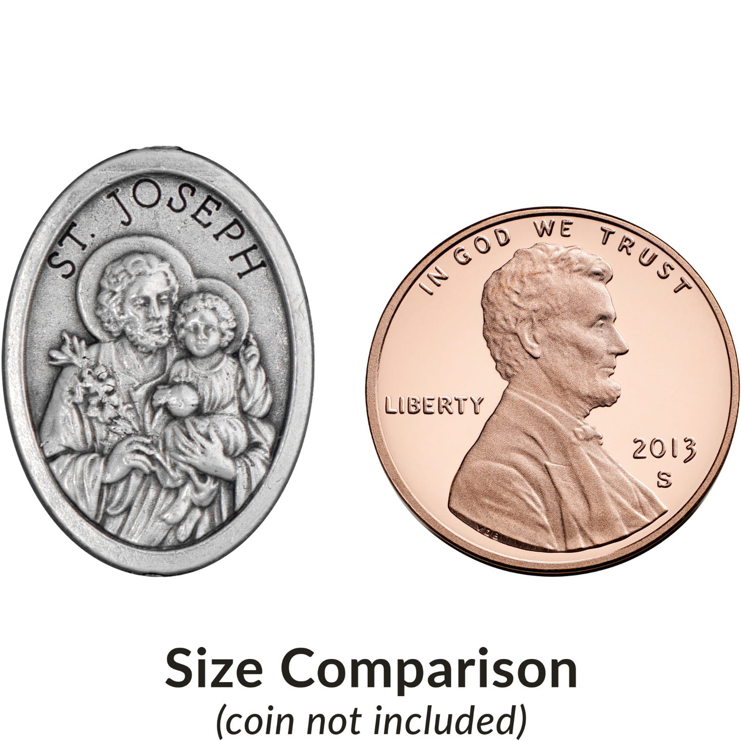 Comparison of a religious medallion and a penny on a white background