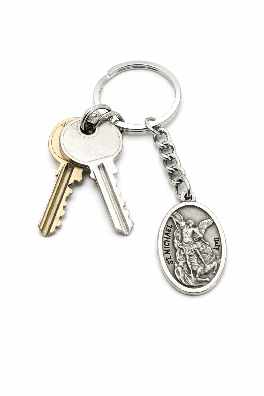 Keychain with keys and ST Michael pendant on a white background