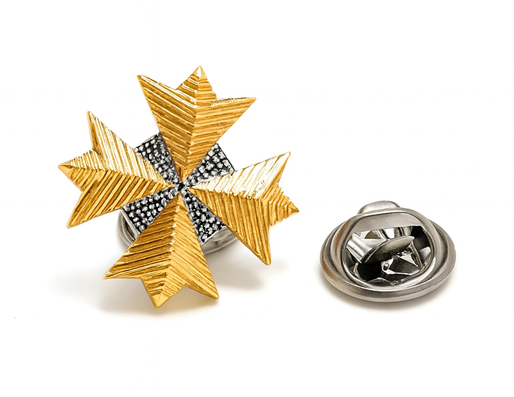 Gold star-shaped lapel pin with a silver clasp on a white background