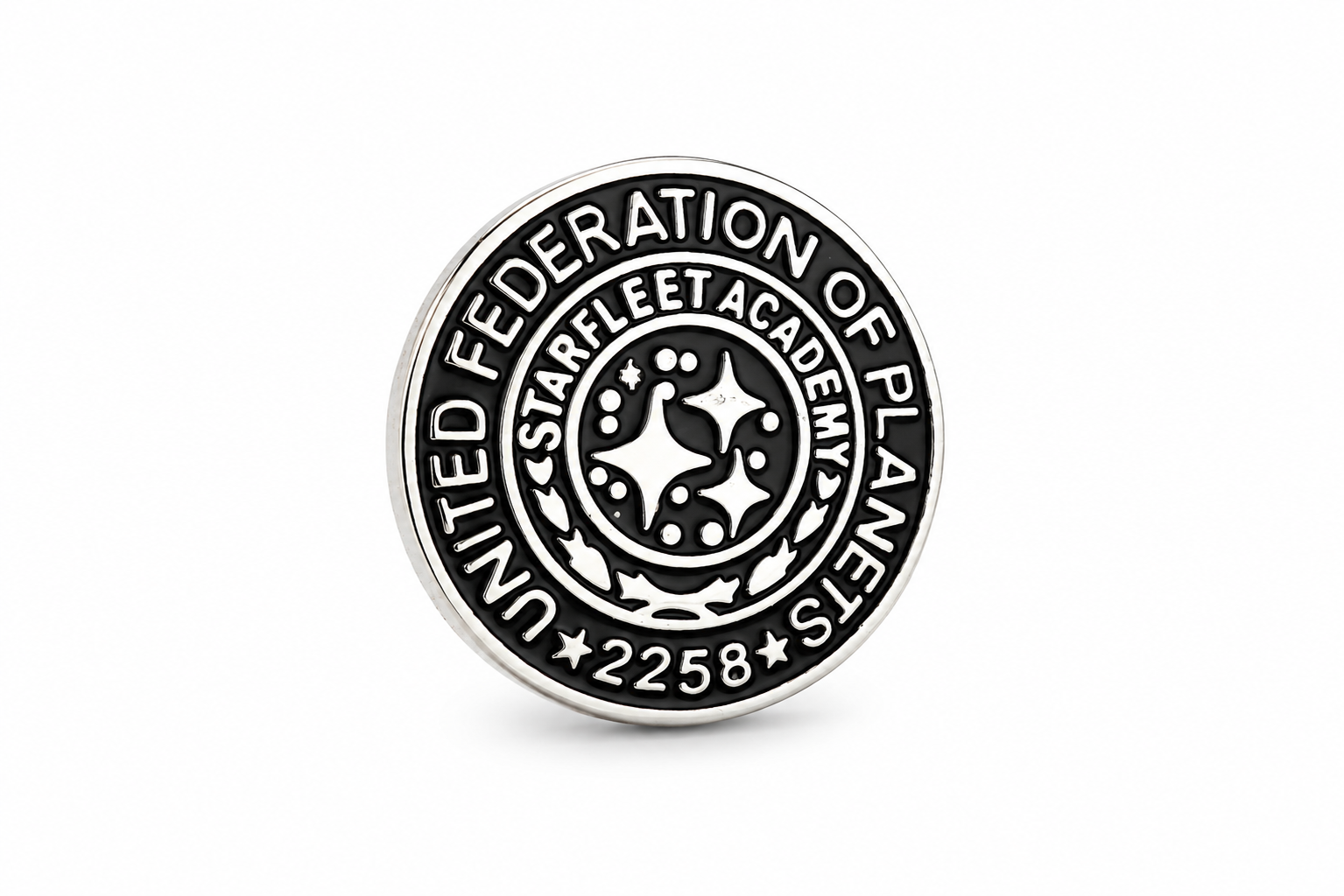 Circular badge with 'United Federation of Planets Starfleet Academy' text on a white background