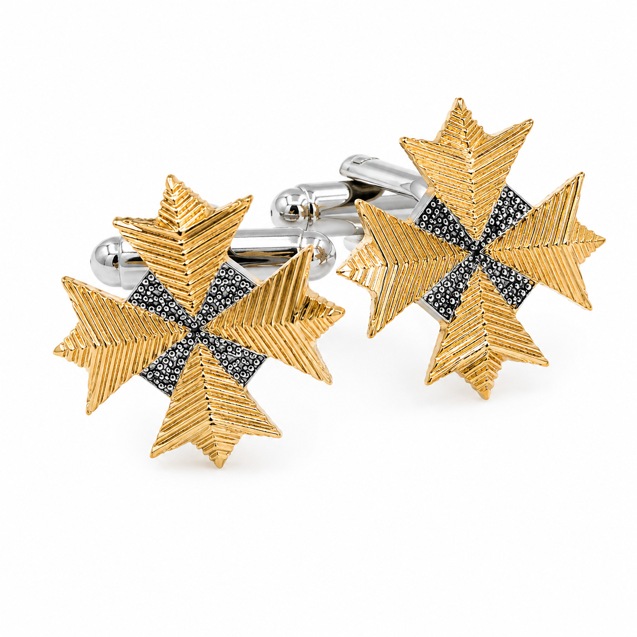 Close-up of Starfleet Admiral rank insignia cufflinks featuring textured gold points and silver center detailing