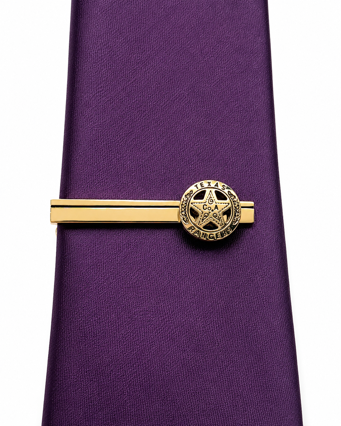 Handcrafted Texas Ranger inspired gold tie clip with polished western badge design and gold finish.