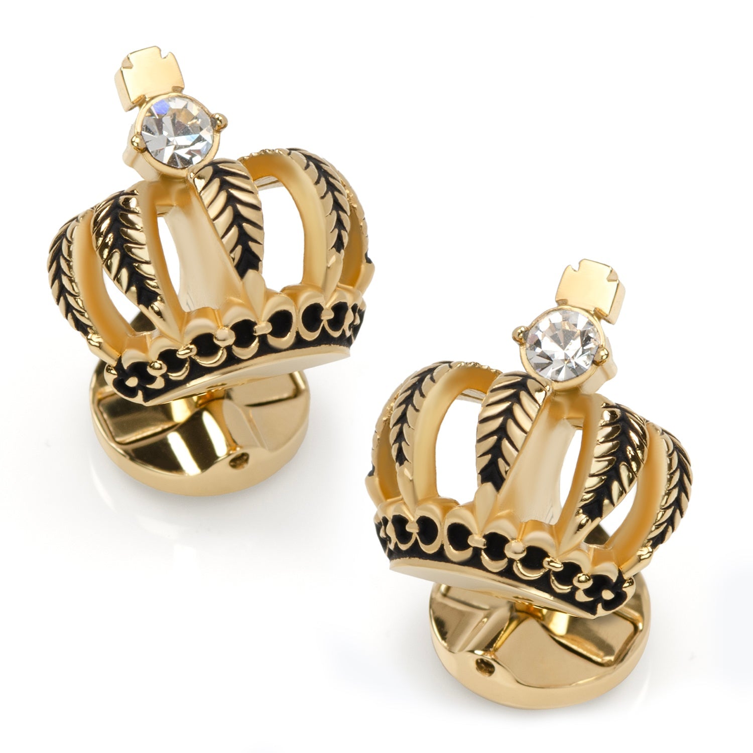 Gold crown-shaped earrings with a central gemstone on a white background